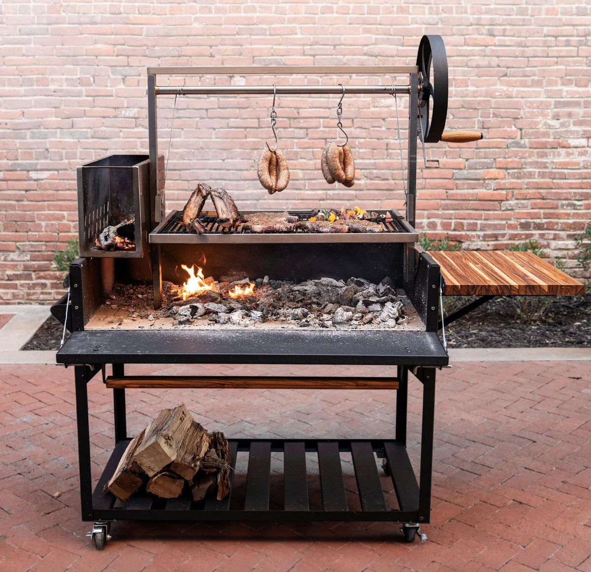 Backyard Discovery Argentine Santa Maria Wood Fire & Charcoal BBQ Grill with Brasero, Adjustable Grill Grates, Fire Bricks, Heavy-Duty Steel, S-Hooks, Acacia Wood Table for Outdoor Gaucho Grilling